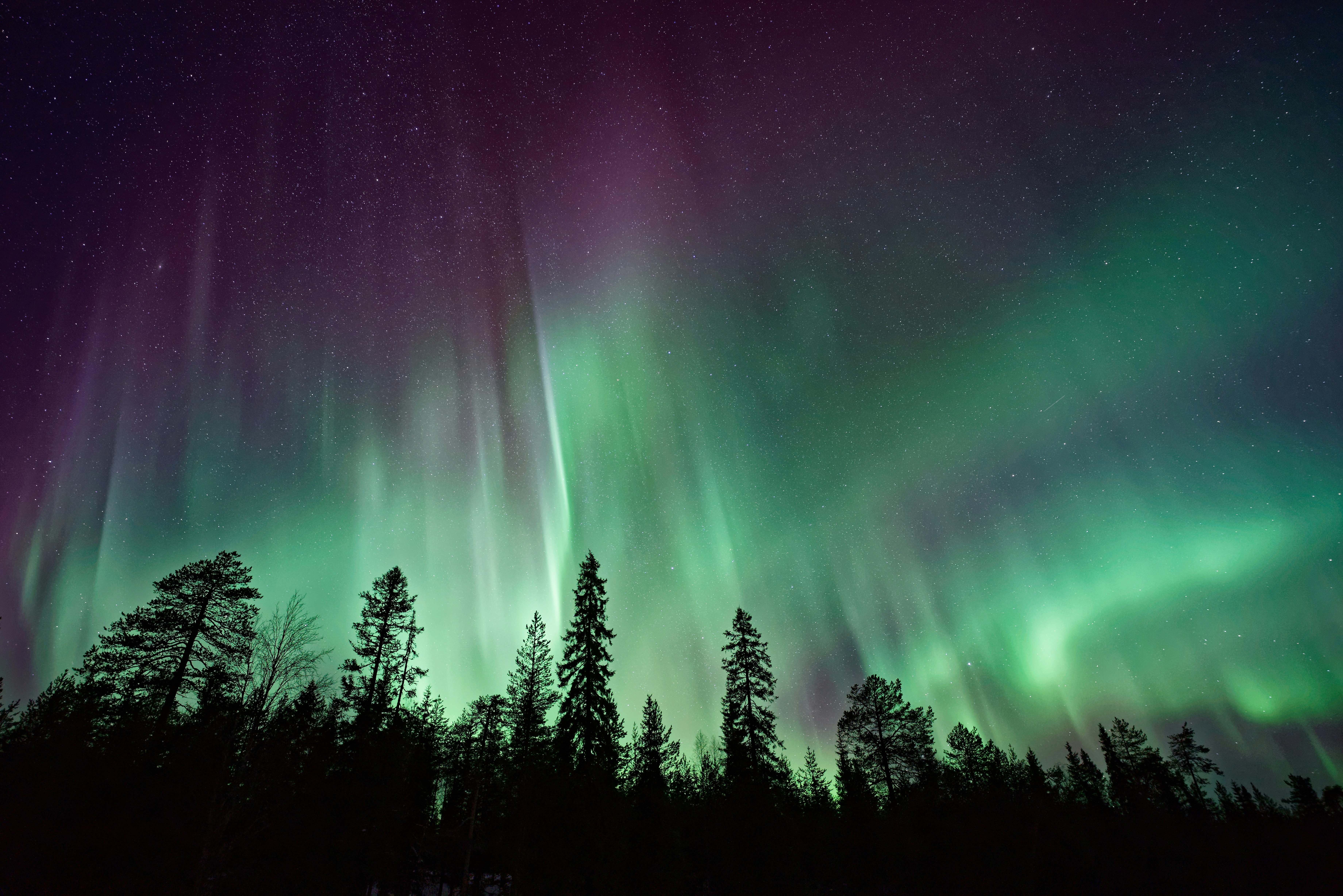 Northern lights over mountains